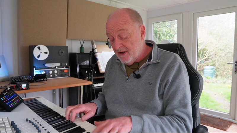 Lucy Hackett playing keyboard